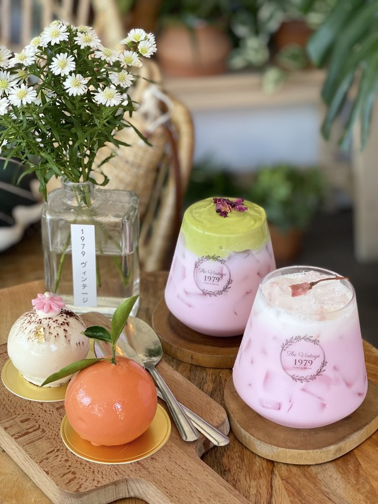 Cakes and drinks on a wood table