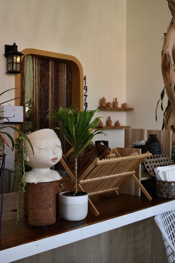 A ceramic planter and wood counter detail
