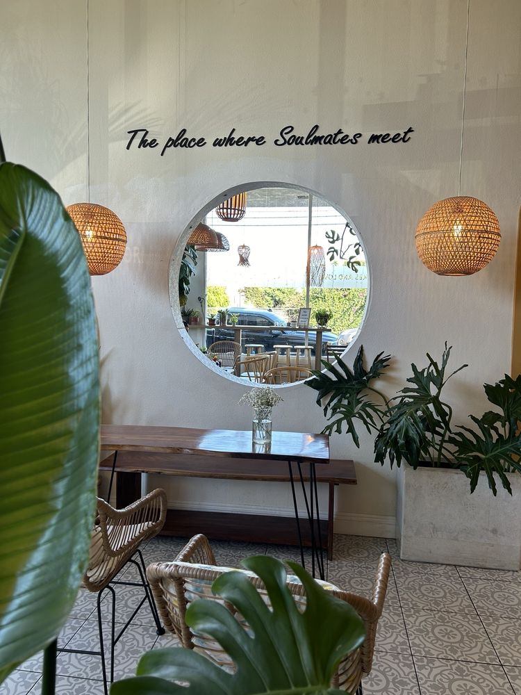 A round window with a sign reading The place where soulmates meet