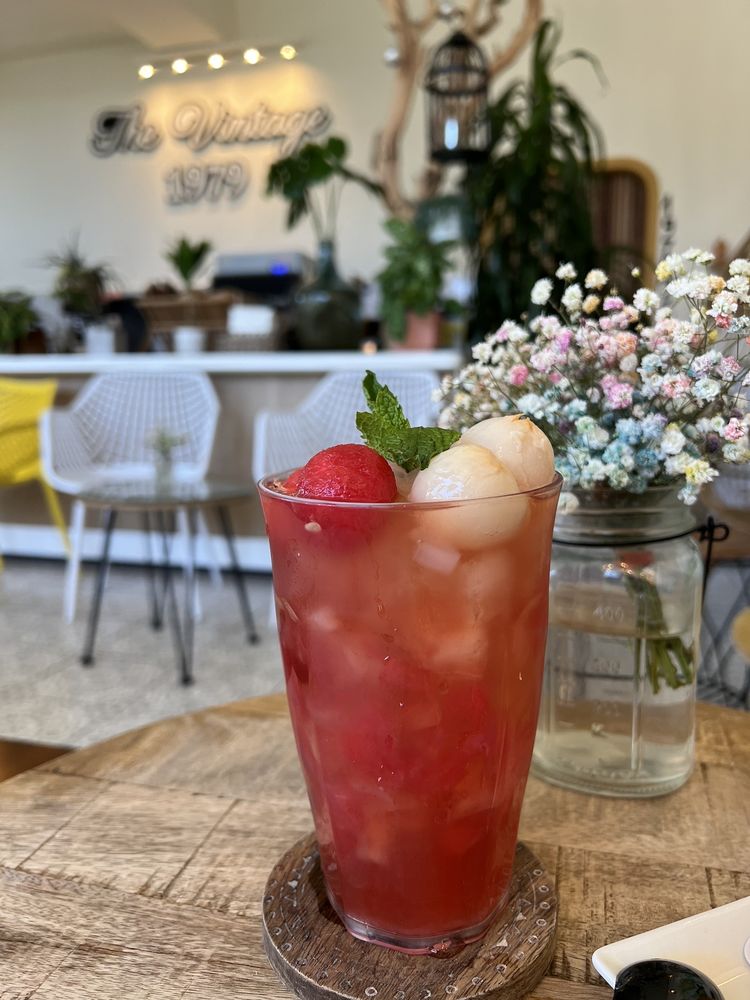 A fruit tea with fresh berries